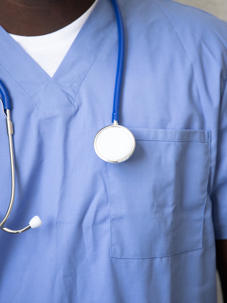 Person in blue medical scrubs